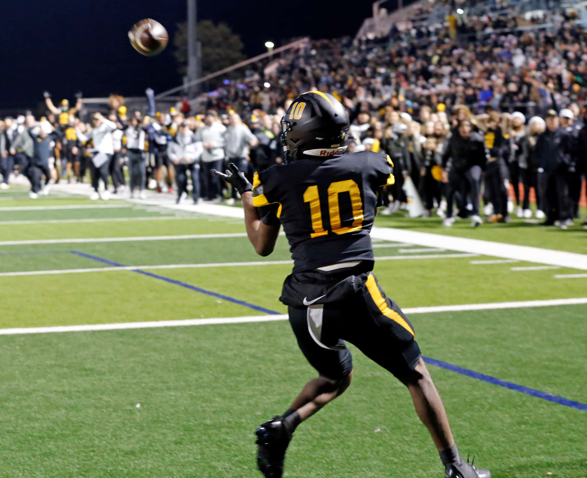 The Forney high bench erupts, as WR Kofi Eduful  (10) catches a two-point-conversion pass in...
