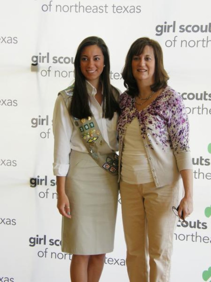 
Jessica Martinez, left, a Girl Scout for 12 years, with her mom, Carrie Martinez, received...