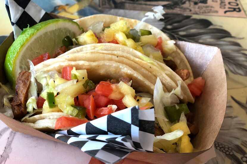 Vegan restaurant Tiki Loco serves plant-based "meat," like this "pork" taco plate.