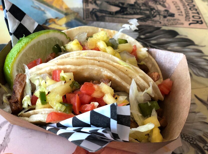 Vegan restaurant Tiki Loco serves plant-based "meat," like this "pork" taco plate.