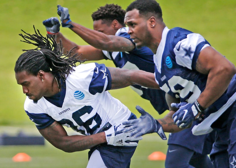 Dallas Cowboys rookies Bo Scarbrough (36) and Chris Covington (59) are pictured during the...