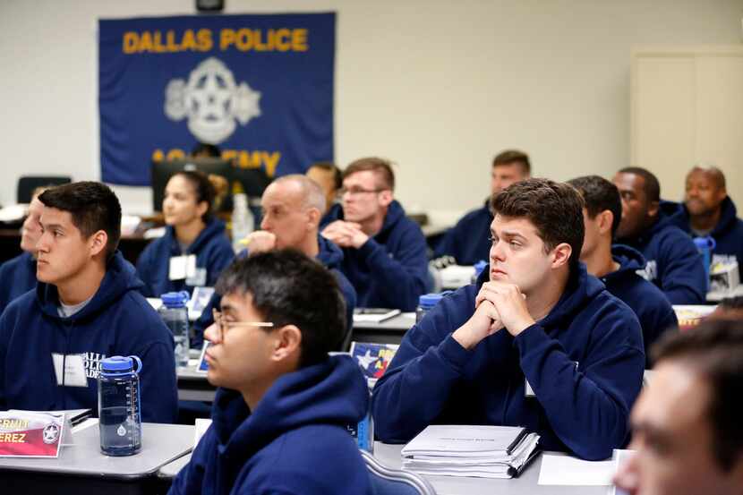 Recruits in Dallas Police Class 365 listen to a lesson about financial peace at the Dallas...