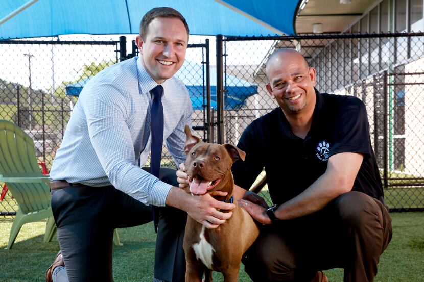 Ed Jamison (right), director of Dallas Animal Services, and Ryan Rogers, assistant director...