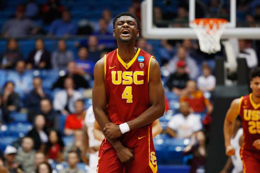 DAYTON, OH - MARCH 15:  Chimezie Metu #4 of the USC Trojans reacts in the second half...