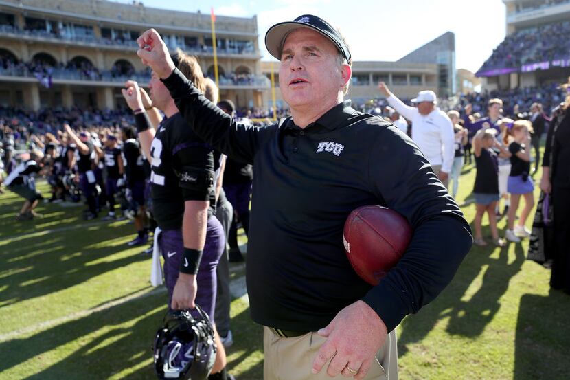 FORT WORTH, TX - NOVEMBER 24:  Head coach Gary Patterson of the TCU Horned Frogs celebrates...