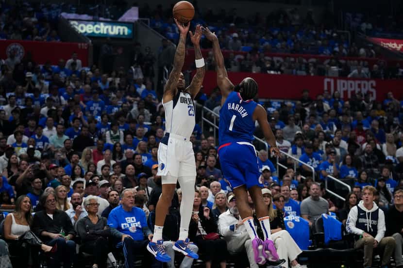Dallas Mavericks forward P.J. Washington (25) shoots against LA Clippers guard James Harden...