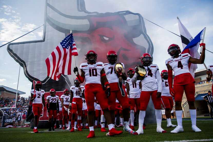 Cedar Hill players prepare to enter the field before a game against Allen on August 30, 2019...