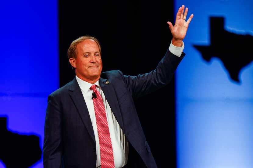 Texas Attorney General Ken Paxton gives a speech during a general meeting as part of the...