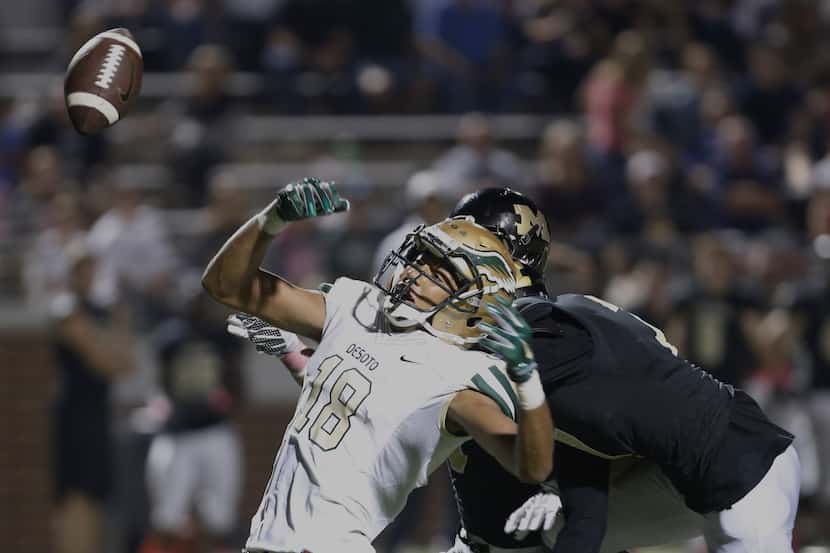 DeSoto senior wide receiver Brendon Rushing (18) is unable to catch a pass as Mansfield...