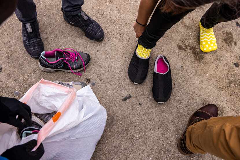 The Downtown Dallas, Inc. homeless outreach team provided shoes to an unhoused woman, whose...