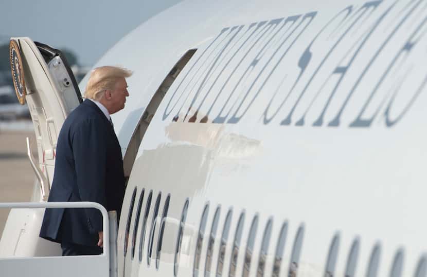 President Donald Trump boards Air Force One prior to departure from Andrews Air Force Base...