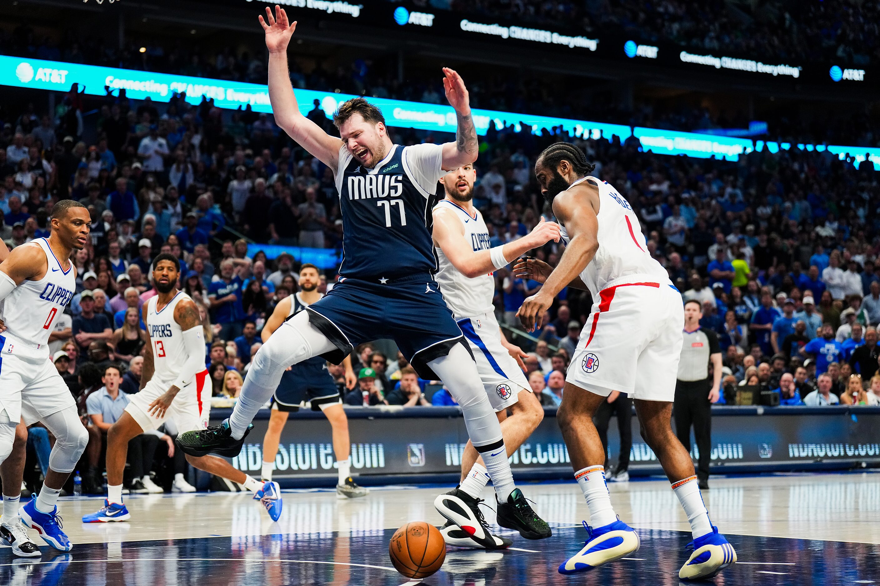 LA Clippers guard James Harden (1) strips the ball from Dallas Mavericks guard Luka Doncic...