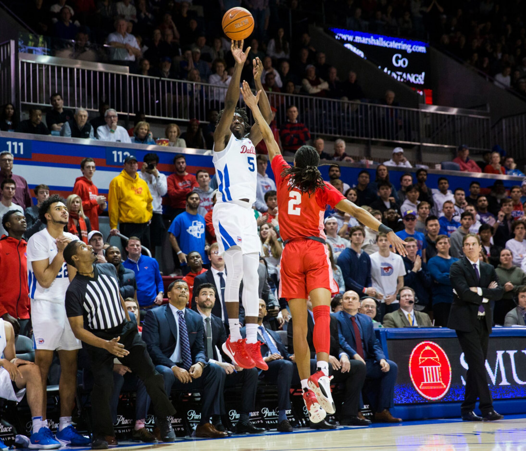 Southern Methodist Mustangs guard Emmanuel Bandoumel (5) makes a three pointer to put SMU up...