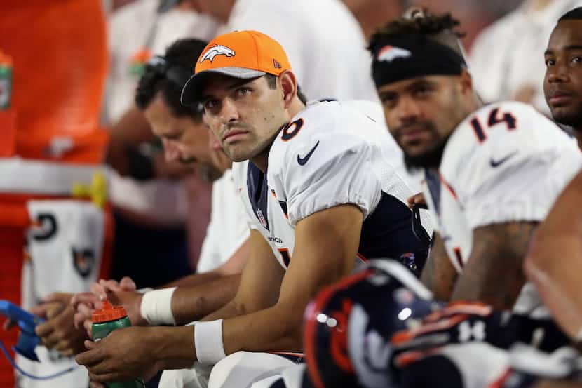 GLENDALE, AZ - SEPTEMBER 01:  Quarterback Mark Sanchez #6 of the Denver Broncos watches from...