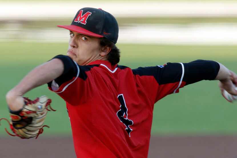 Flower Mound Marcus pitcher Blake Mayfield (4) delivers a pitch to a Southlake batter during...