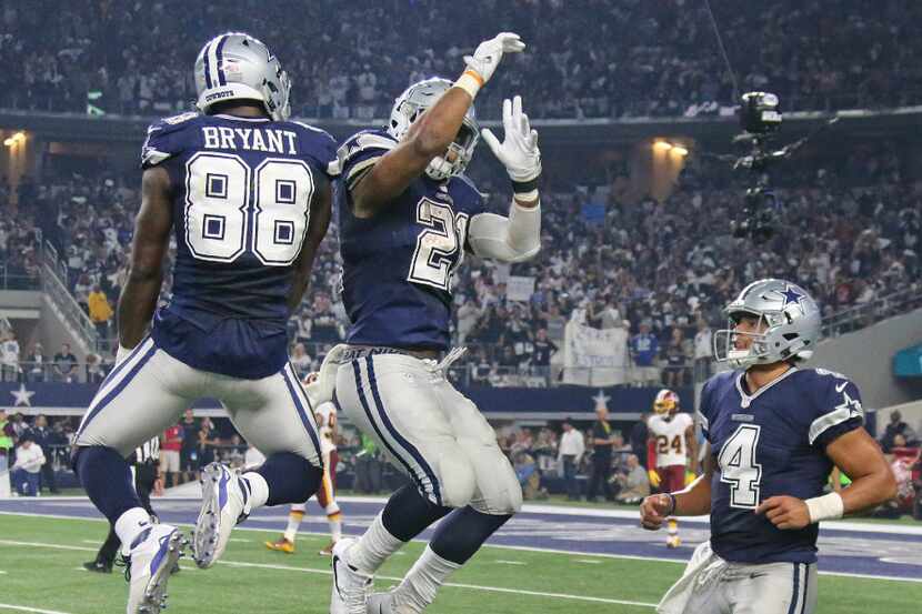 Dallas Cowboys wide receiver Dez Bryant (88), running back Ezekiel Elliott (21) and...