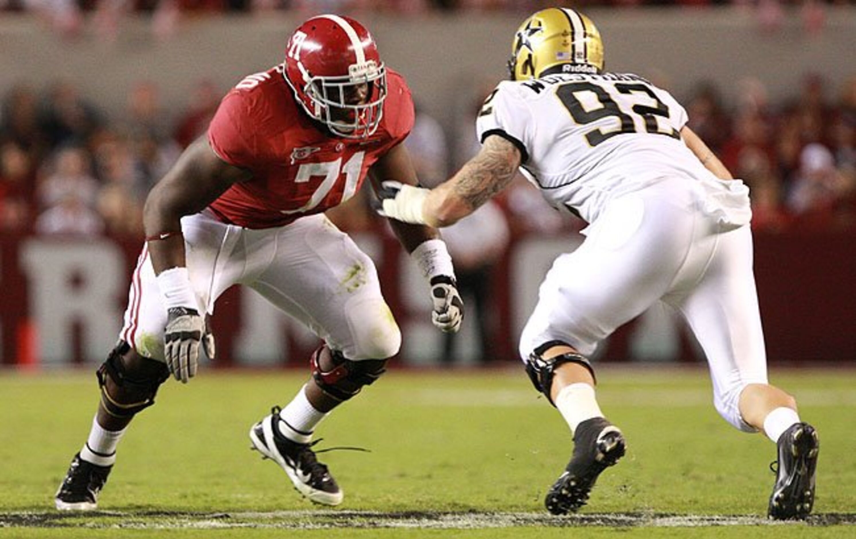 Cyrus Kouandjio, Jr./OT/Alabama/Versatile enough to open up running lanes at right tackle or...