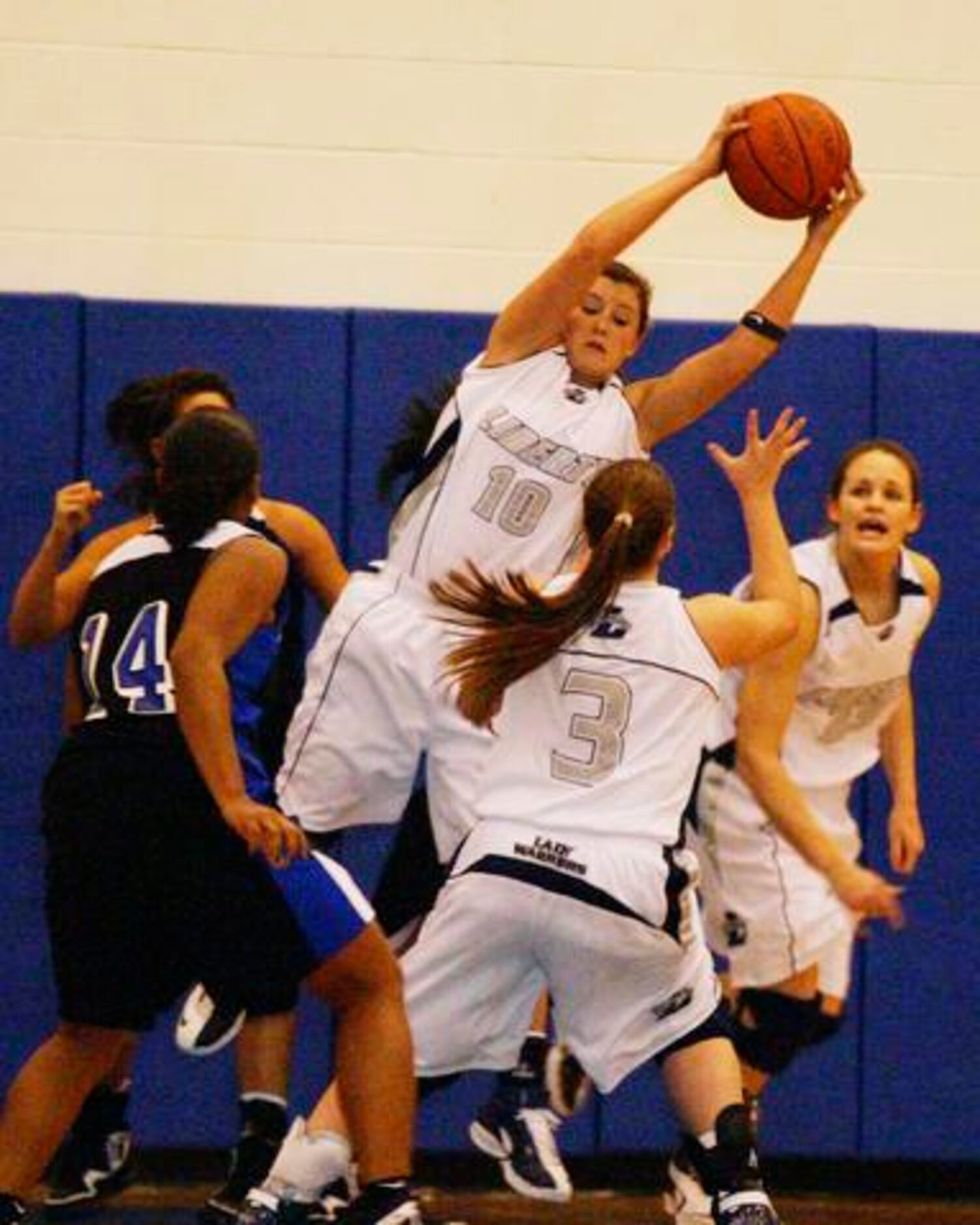 Argyle Liberty Christian senior forward Ali Horton (10) tries to pass to senior guard...