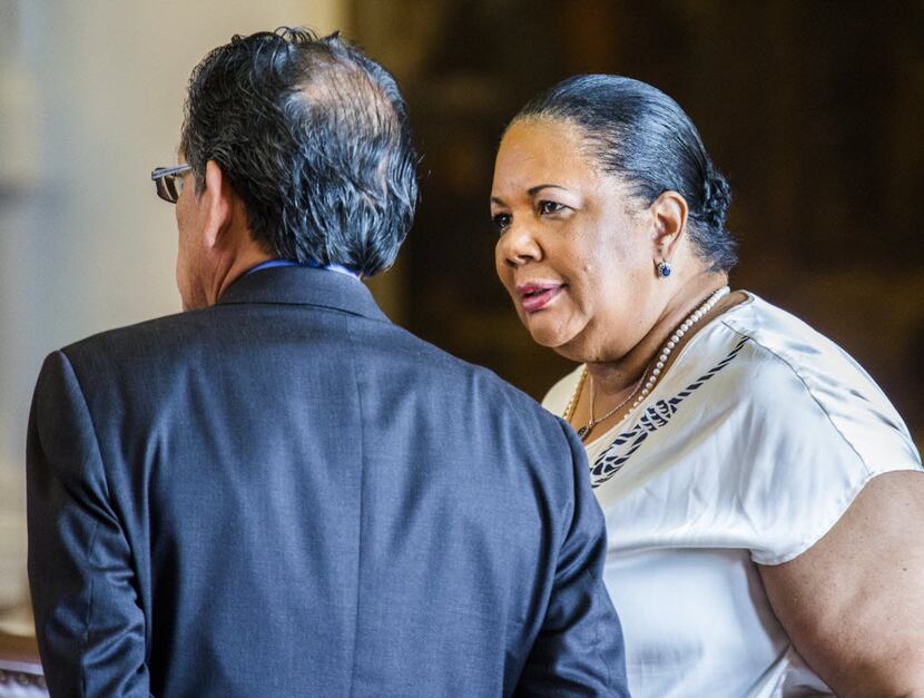 Rep. Roberto R. Alonzo, D-Dallas, talked with Rep. Yvonne Davis, D-Dallas, during the final...