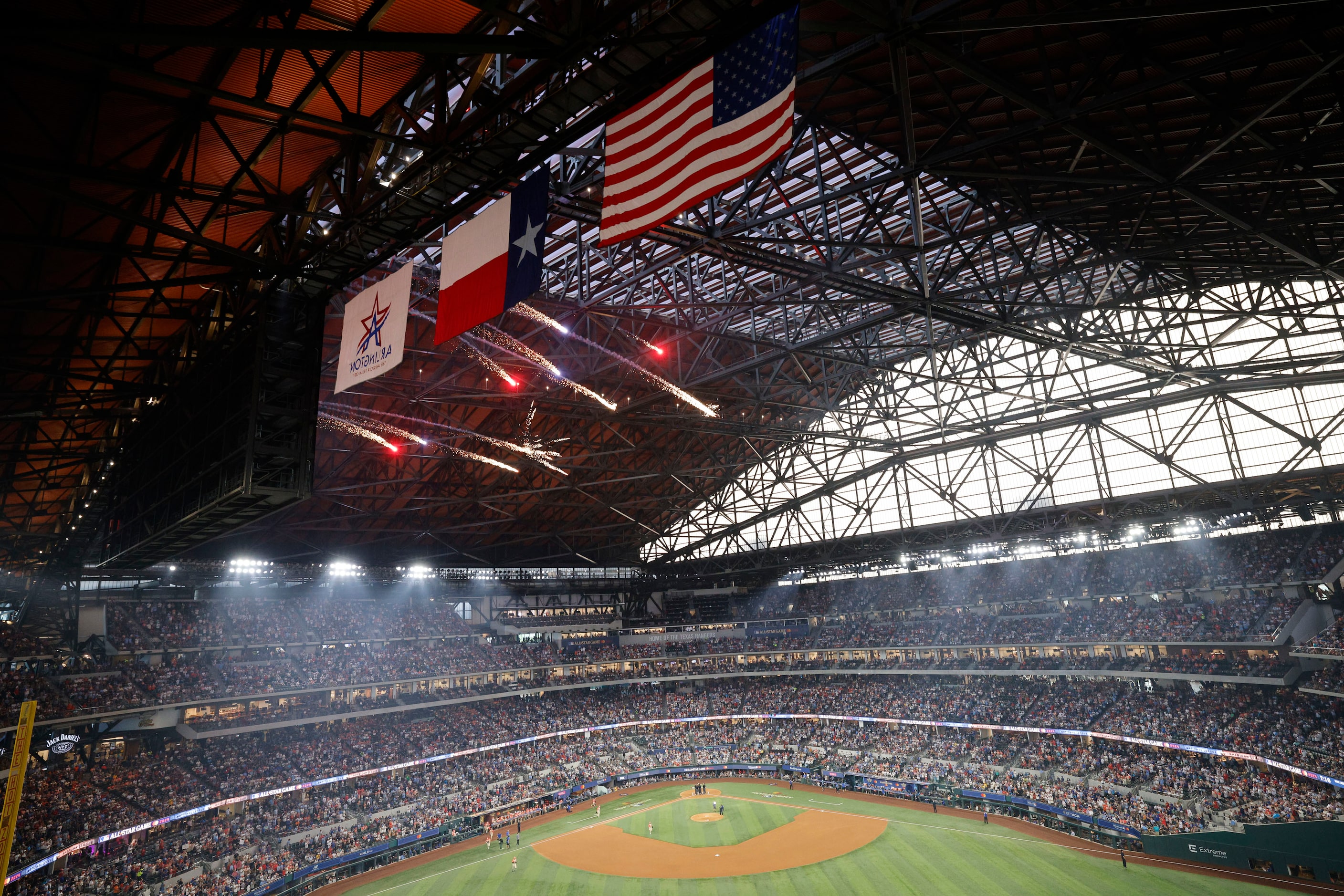 Fireworks explode before the MLB All-Star baseball game at Globe Life Field, Tuesday, July...