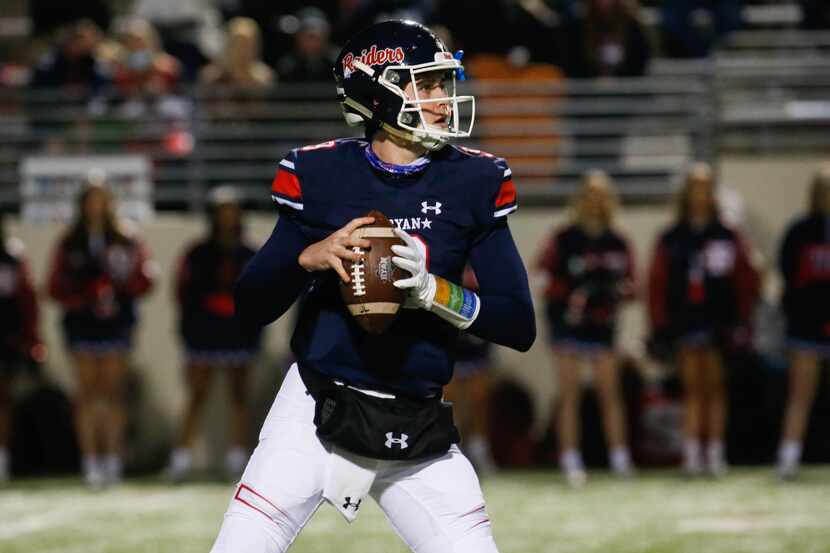 Denton Ryan's quarterback Seth Henigan (9) gets ready to throw the ball during the second...