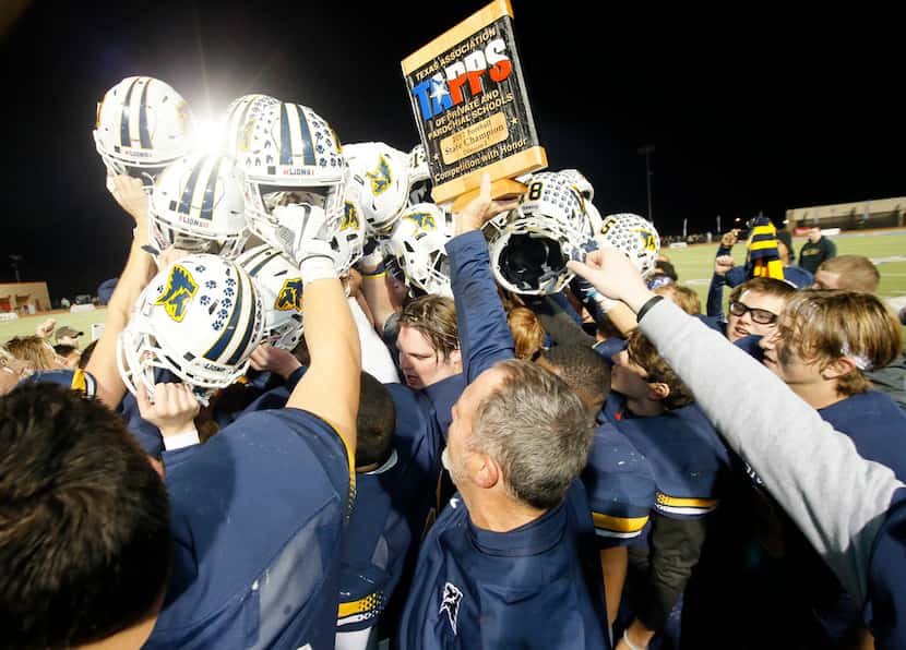 Prestonwood Christian Academy football celebrates after winning the TAPPS Division 1 11-man...