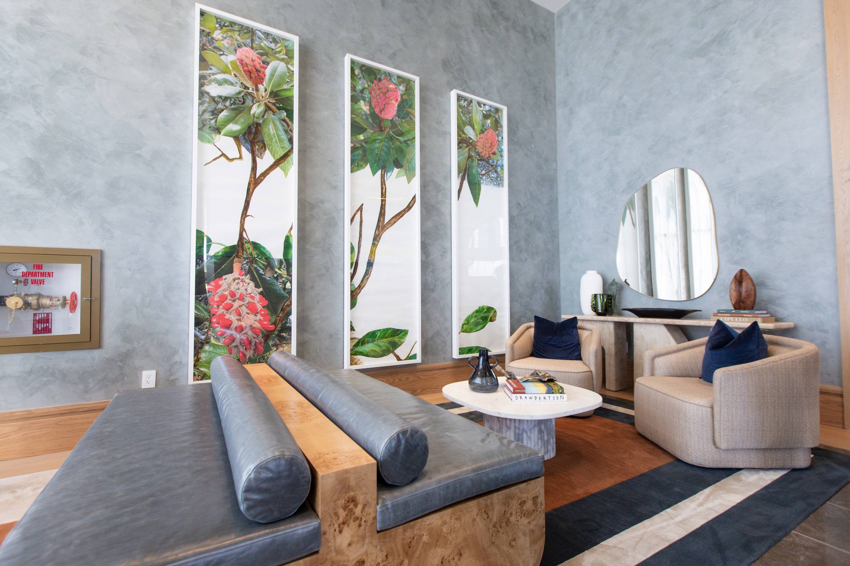 A seating nook near reception is the first taste of local flora displayed in art throughout...