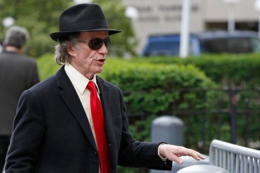 Sam Wyly walks into U.S. District Court in Manhattan, Tuesday, May 6, 2014, in New York....