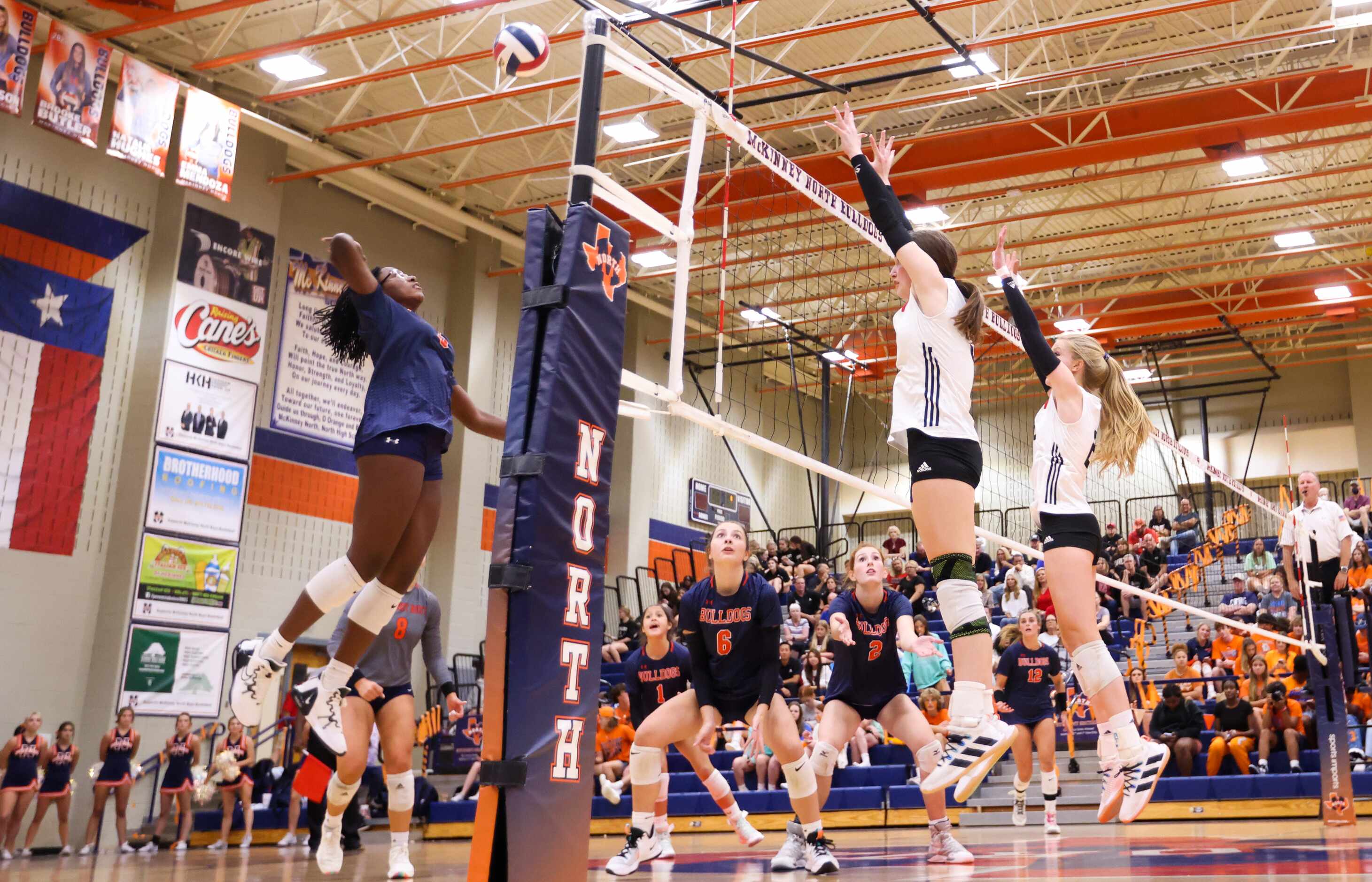 McKinney North Ayanna Moore (5) leaps to spike the ball during the fourth set of a match...