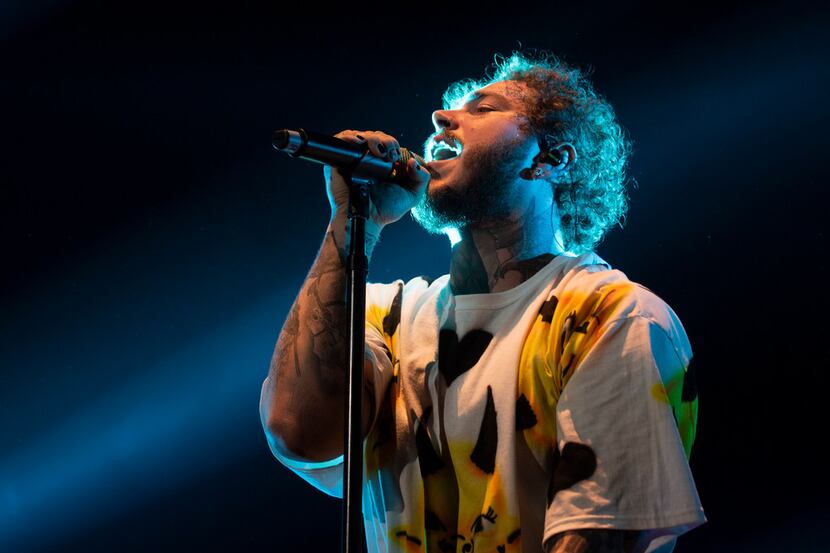 Post Malone performs during Posty Fest at the Dos Equis Pavilion on Sunday, Oct. 28, 2018.
...