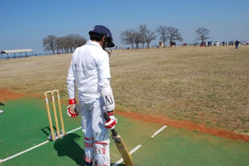 
Ishaan Manohar prepares mentally to face an adult bowler at an unofficial cricket match...