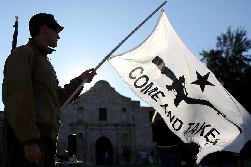 Michael Devine, of Temple and a member of the Texas State Militia, waits for the "Come and...