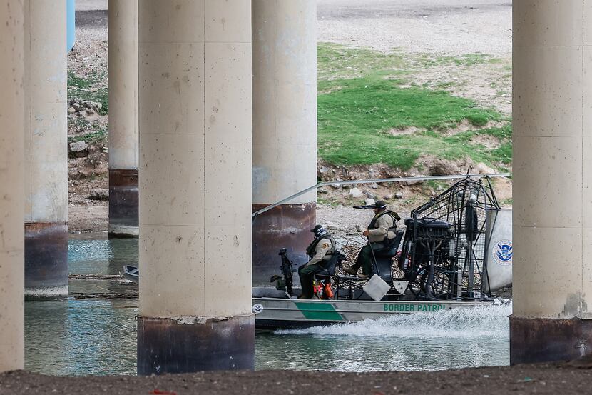 U.S. Border Patrol officers on an airboat patrol the Rio Grande in Eagle Pass. Eagle Pass is...