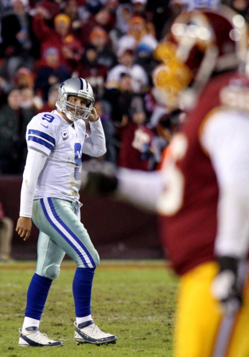 Dallas Cowboys quarterback Tony Romo (9) dejected after a play in a game against the...