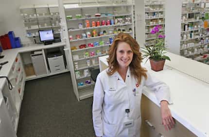 Pharmacist Julie Caldwell said the Walgreens Community Pharmacy at 7859 Walnut Hill Lane in...
