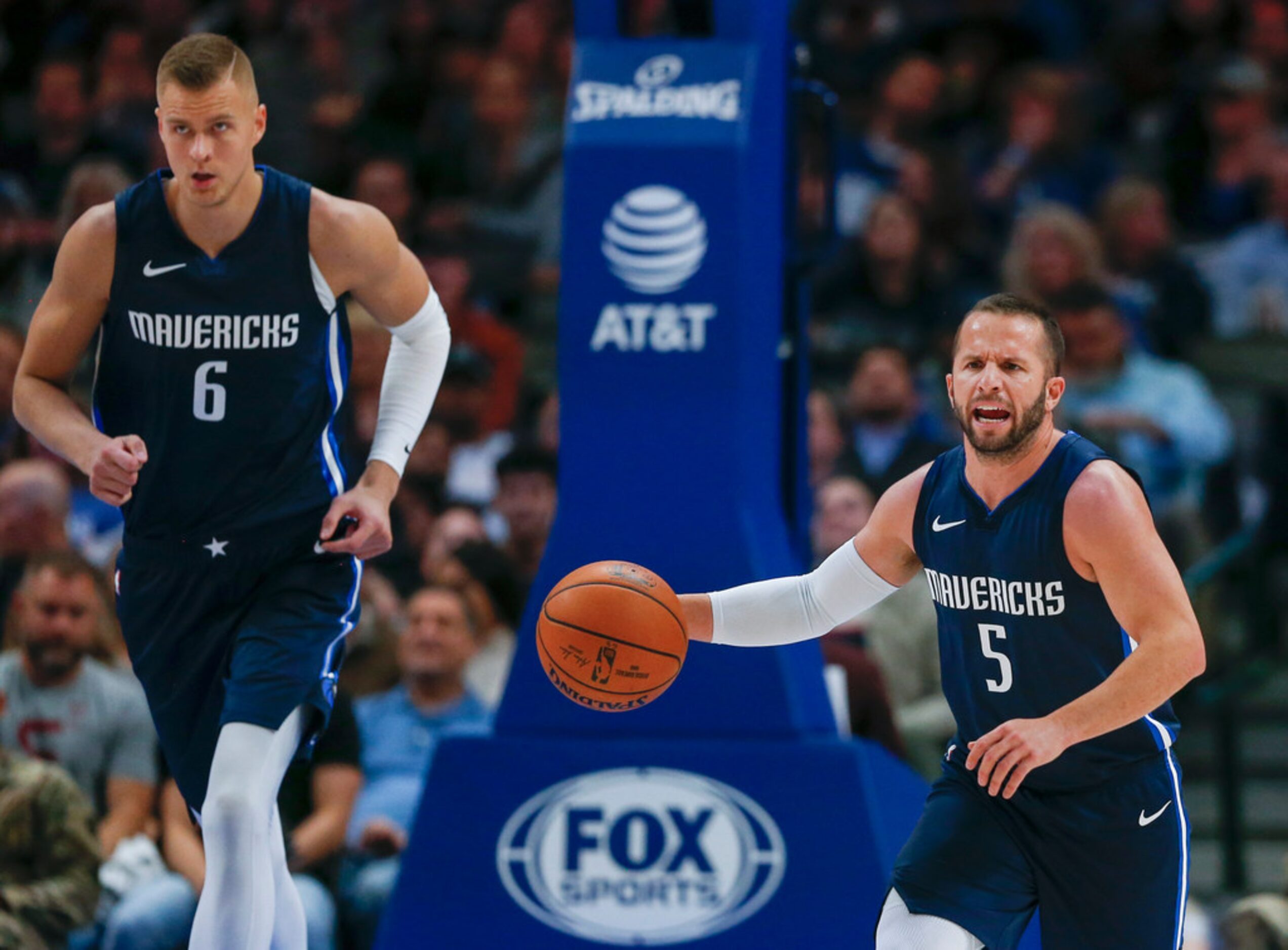 Dallas Mavericks guard J.J. Barea (5) takes control of the ball during an NBA game between...