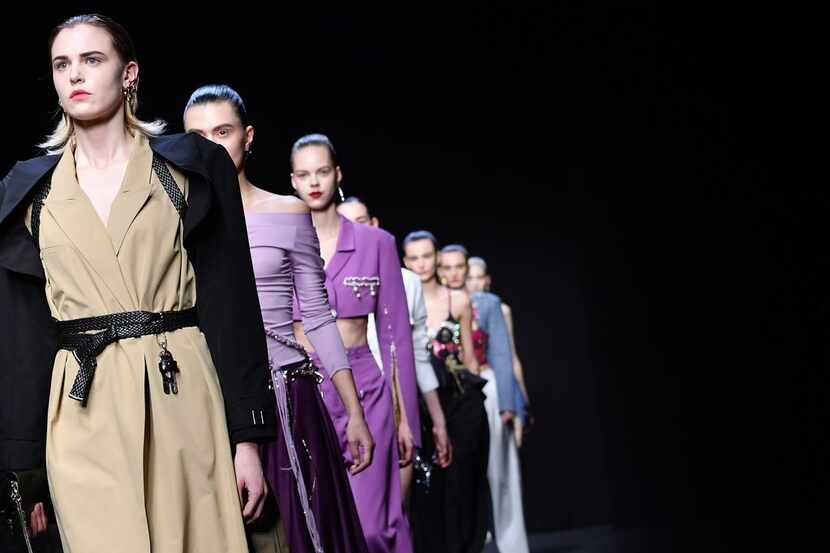 Models presented creations for Chinese designer Han Wen's fall -winter collection as part of...