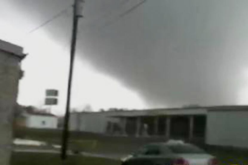 e from video and released by WSB-TV in Atlanta shows a tornado moveing through the town of...