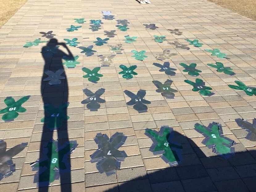 Cutouts taped at Baylor University to remind students of the sexual assault scandal.