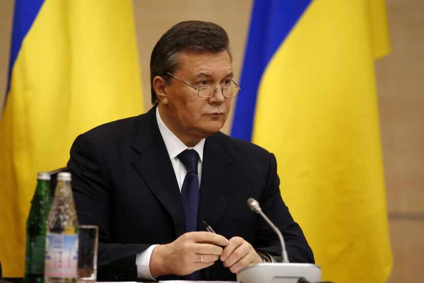 Ukraine's fugitive President Viktor Yanukovych speaks at a news conference Friday in...