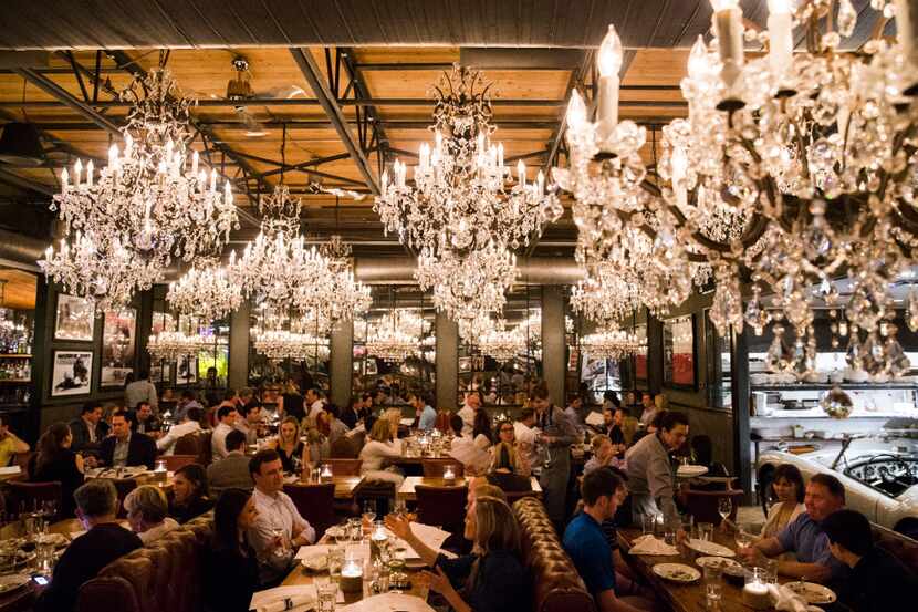 Sixty-four crystal chandeliers decorate the dining room at Town Hearth.  (Ashley Landis/The...