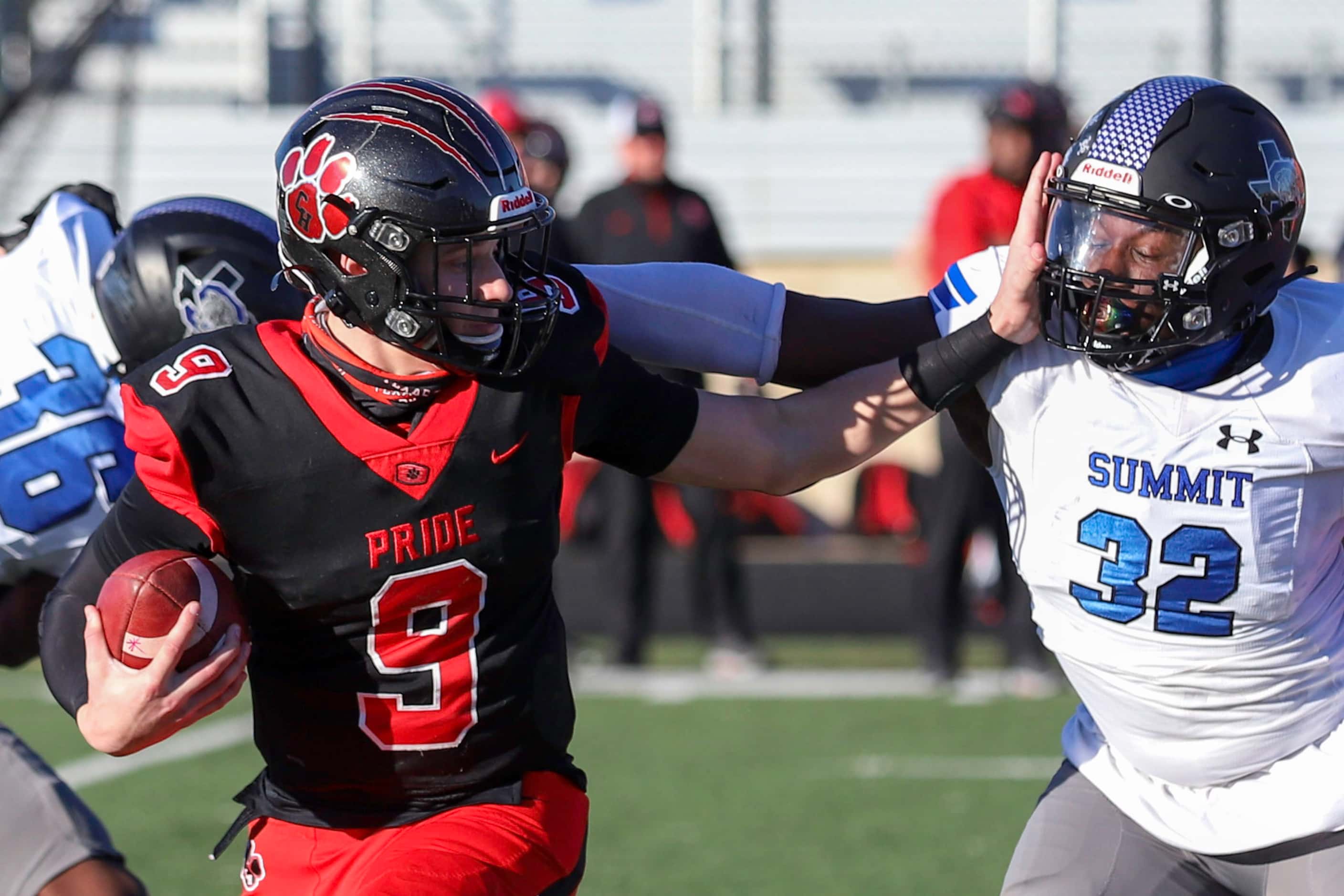 Colleyville Heritage quarterback Brenen Hawkins-Roth (9) gives a stiff-arm to Mansfield...