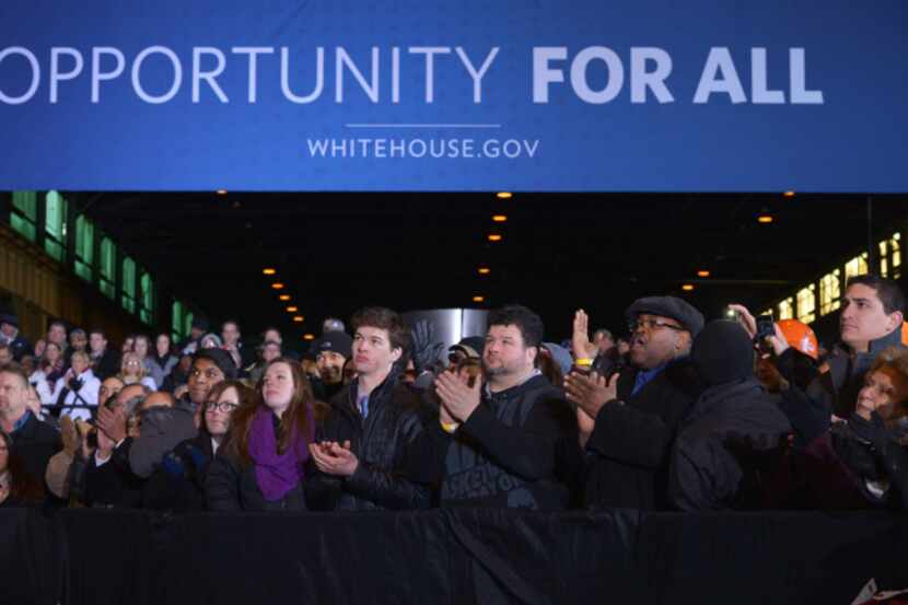 Attendees applaud as US President Barack Obama speaks after a tour the US Steel Irvin Plant...