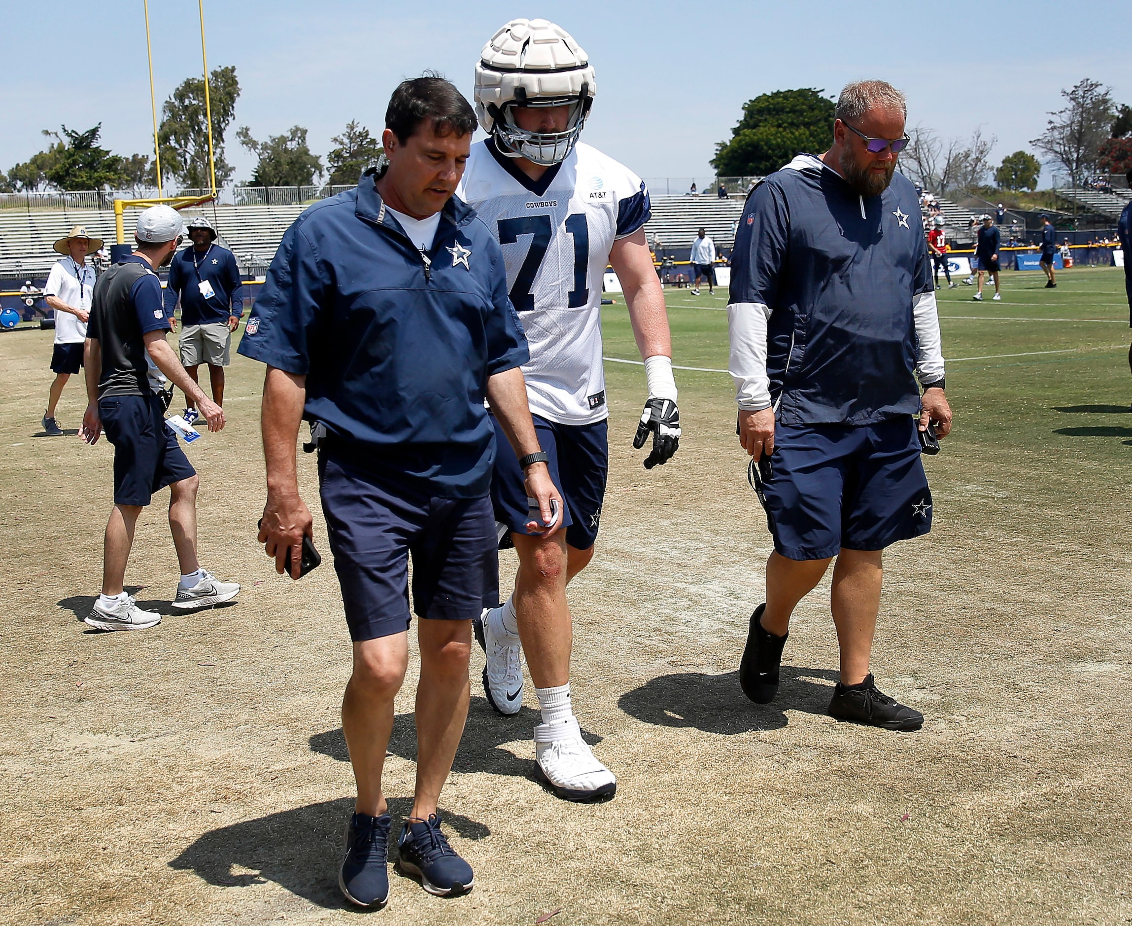 Dallas Cowboys rookie offensive tackle Matt Waletzko (71) is flaked to the locker room...