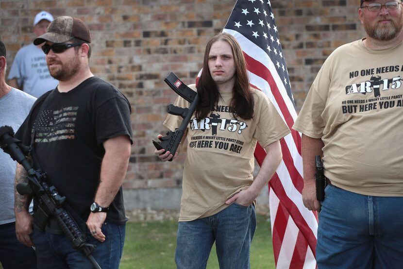 Advocating for the rights of gun owners, a group of demonstrators stage a counter-protest...