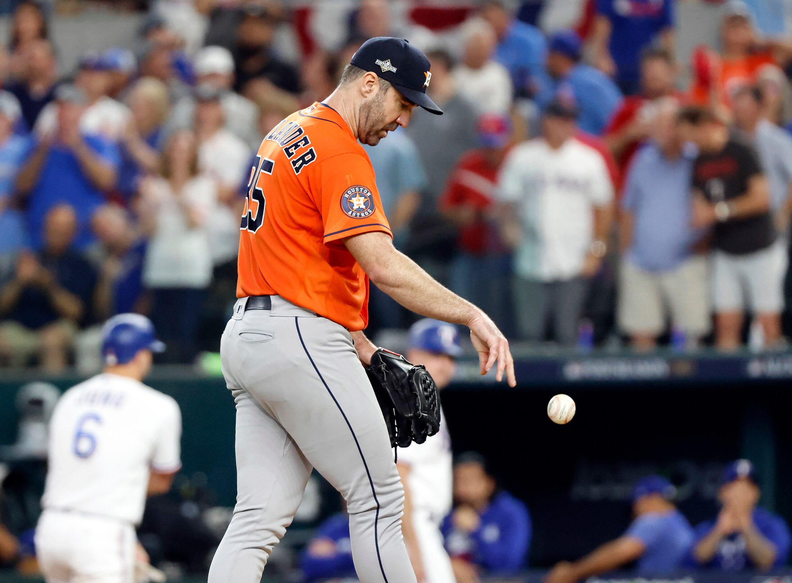 Houston Astros starting pitcher Justin Verlander (35) bounces the baseball off the pitching...