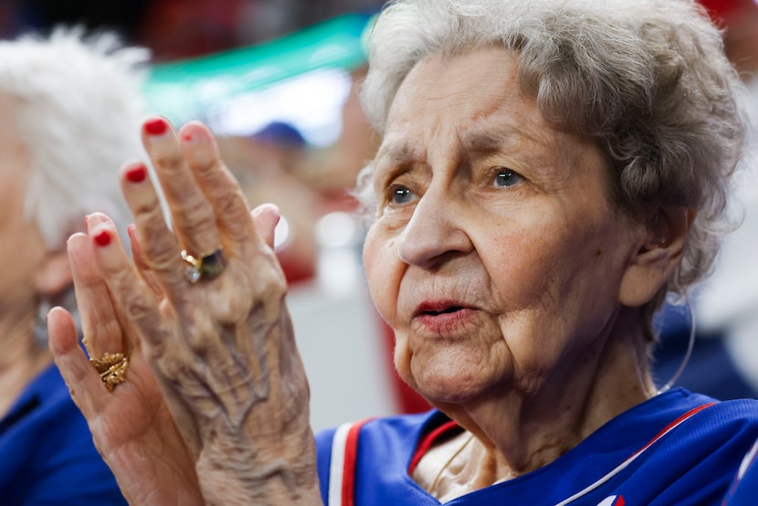 Texas Rangers 93-year-old fan Dorothy Jones cheer in Game 2 of the baseball World Series...