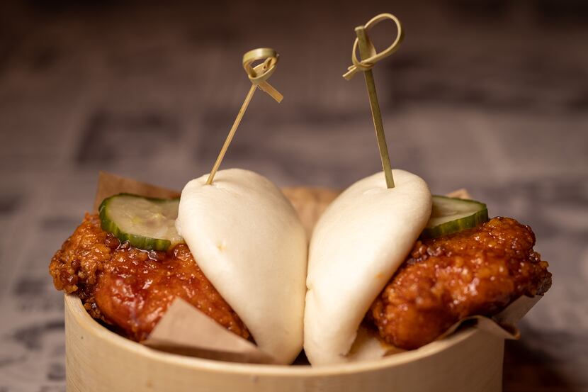Hawkers Asian Street Food sells two kinds of bao (steamed buns): pork belly, pictured here,...