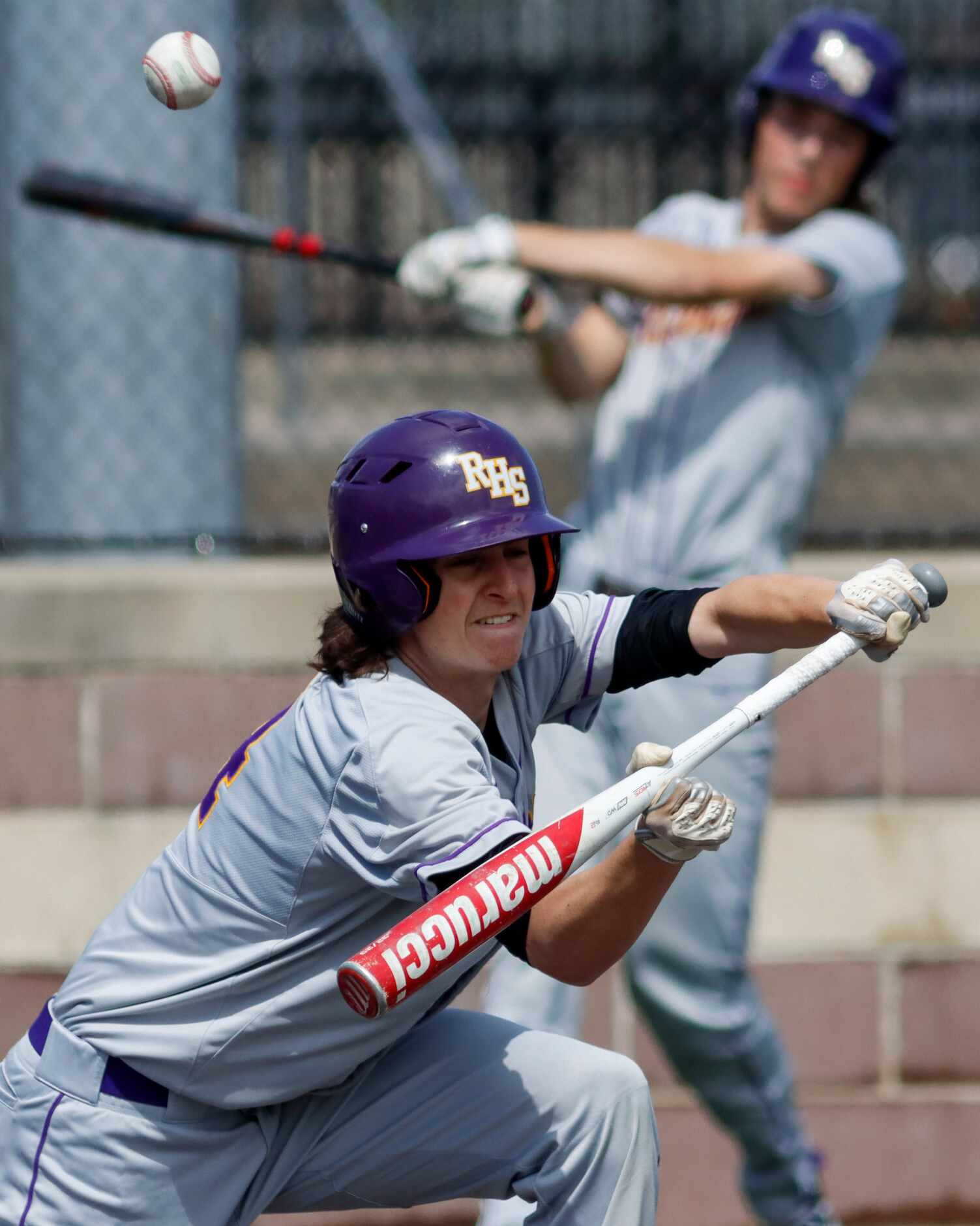 Richardson right fielder Tyler Gillett attempts to bunt during a district 7-6A game against...