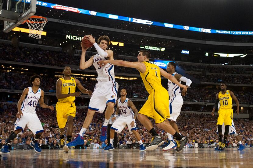 Jeff Withey (5) of the University of Kansas Jayhawks grabs a rebound against the University...